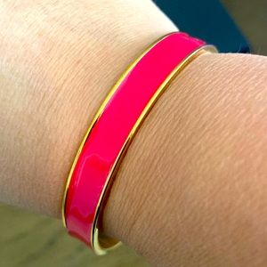 Kate Spade pinky red and gold bangle